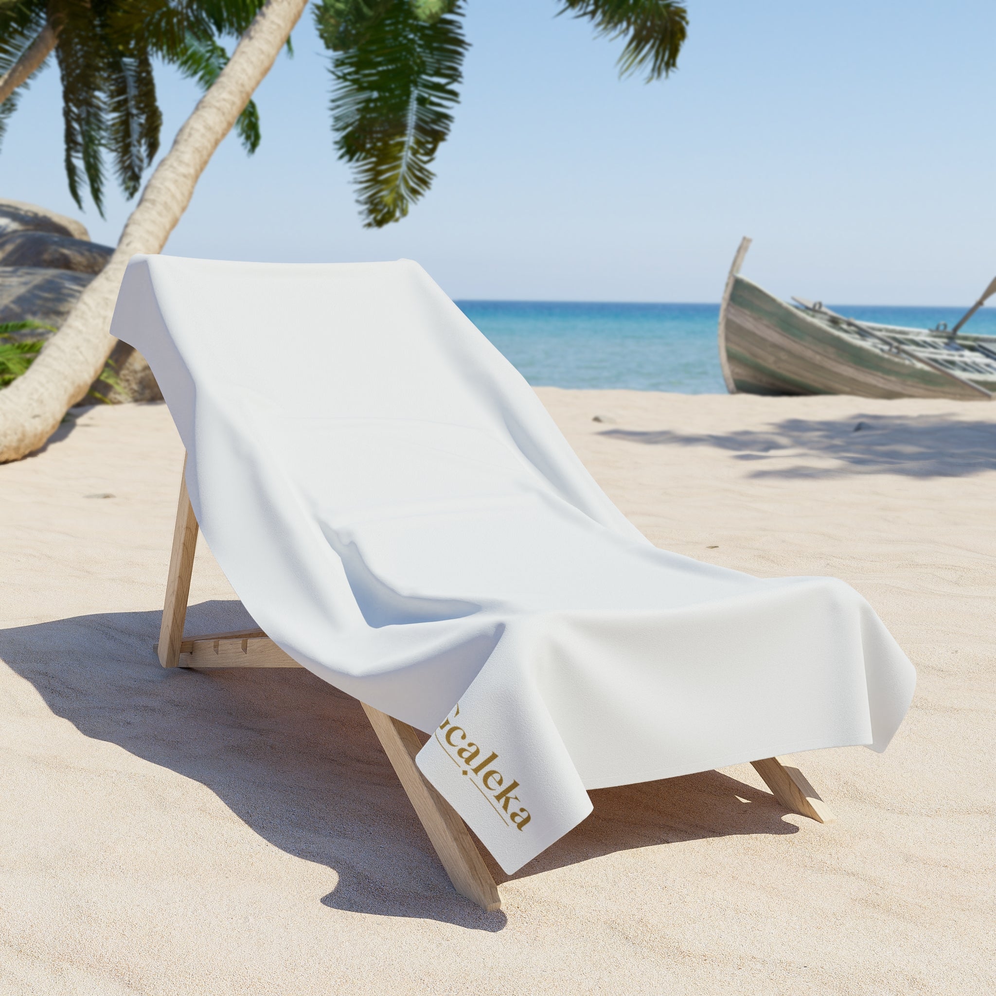 White Beach Towel with Small Gold 'Gcaleka' Logo — Minimal Luxury Pool & Resort Towel
